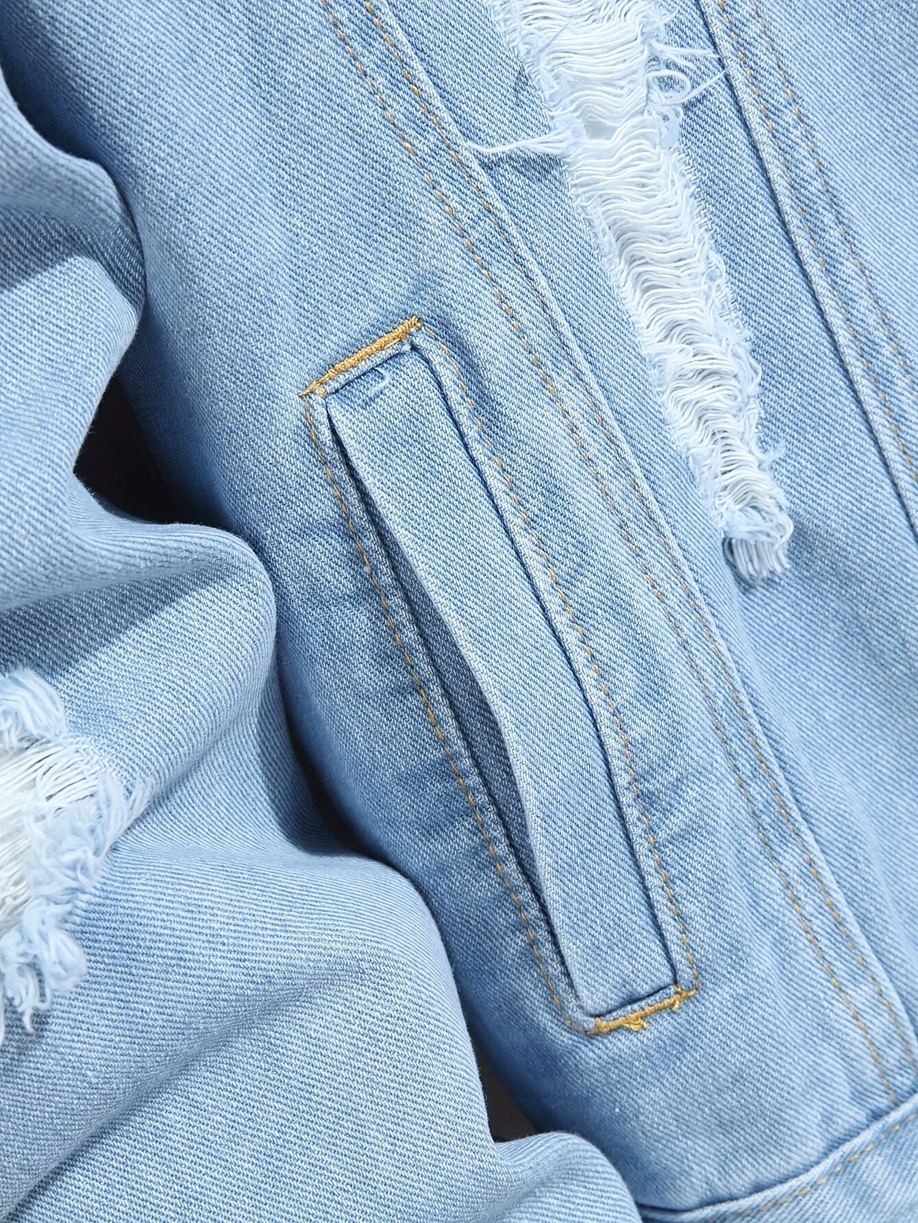 Campera de denim desgastada con capucha interior desmontable